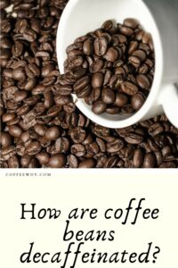 How are coffee beans decaffeinated?
